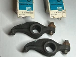 Two Nos Gm 3837030 1950-58 Chevy 1953-55 Corvette Rocker Arms W/ Adj Screw & Nut. Fixed Price $89.00.