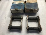 N.o.s. Ford Torino Fairlane Rear Spring Shackles Pair D1OZ-5630-A. Fixed Price $200.00.