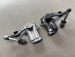 Pair Of Oem Triumph TR4 TR250 TR6 Armstrong Shock Absorbers - Tested And Working. Fixed Price $150.00.