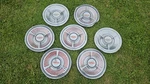 Set Of 7 1962 Oldsmobile Starfire Deluxe 14" Hubcaps Wheel Covers. Fixed Price $179.00.