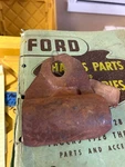 Nos 1957 Ford Passenger Rear Shock Mount Bracket #B7A-18179-B. Fixed Price $34.99.